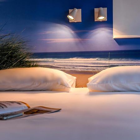 Les Vagues Hotel Restaurant Biscarrosse-Plage Exterior photo