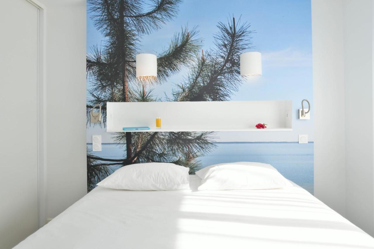 Les Vagues Hotel Restaurant Biscarrosse-Plage Exterior photo