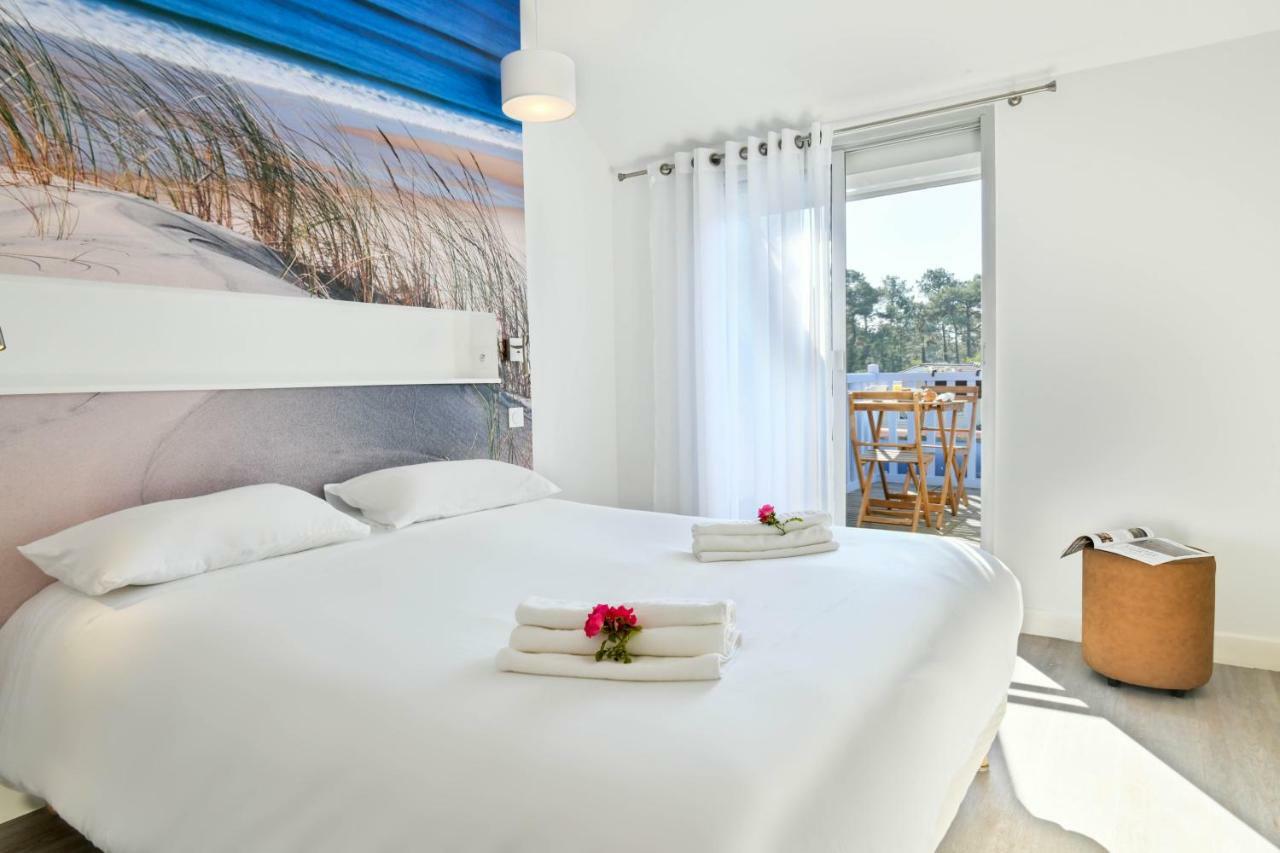 Les Vagues Hotel Restaurant Biscarrosse-Plage Exterior photo